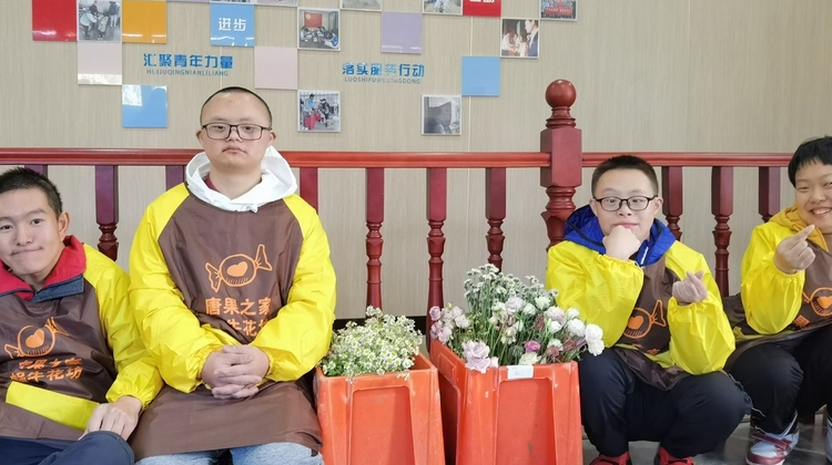 蜗?；ǚ焕锘募?我市第一家心智障碍者创业花坊开业
