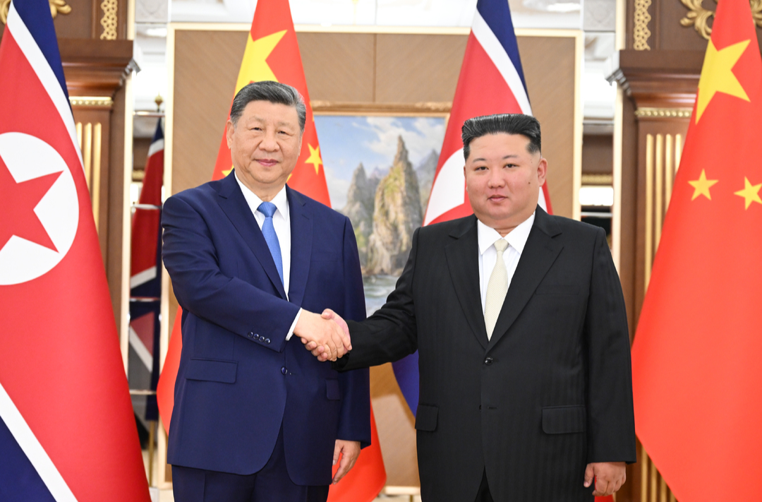 习近平同金正恩举行会谈